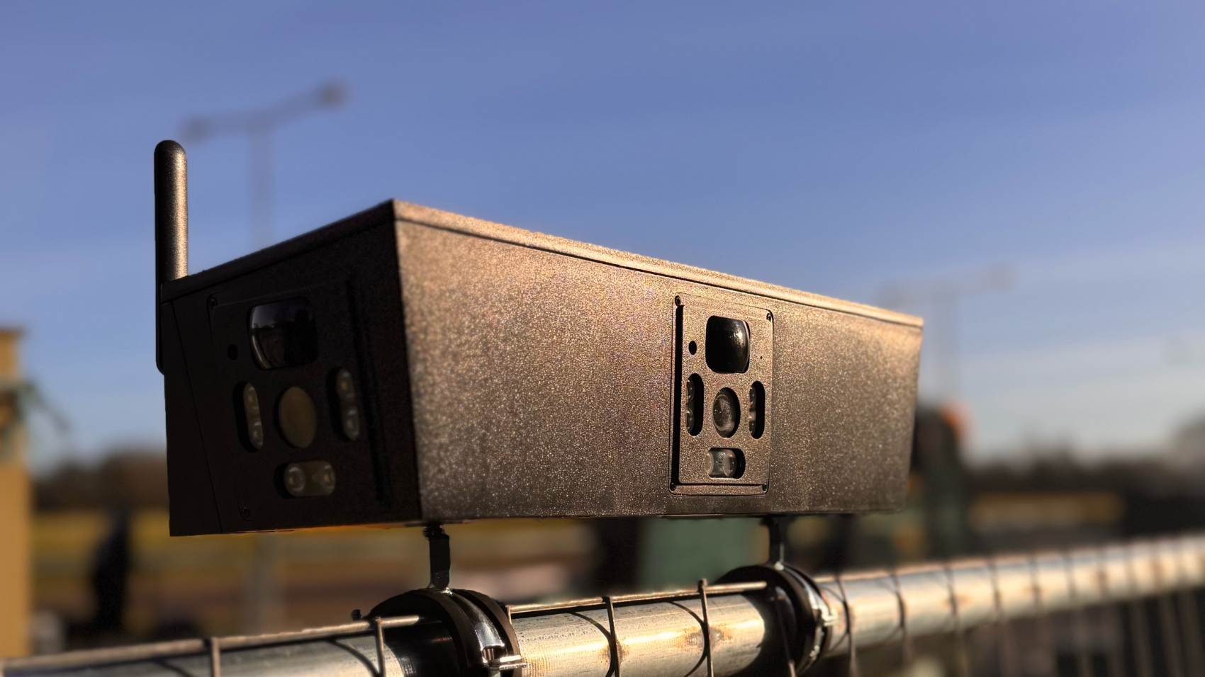 Cuegle®Cam mounted on Heras fencing